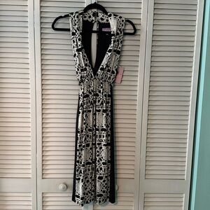 Designer Vivienne Tam NWT Sz Large elegant deep V front and back dress.